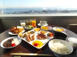 a tray of food on a table with rice at Yokohama Techno Tower Hotel in Yokohama