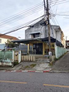 a building on the side of a street at MANITA Banyainim in Krabi