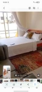 a bed in a room with at Lins Haven in Kilifi