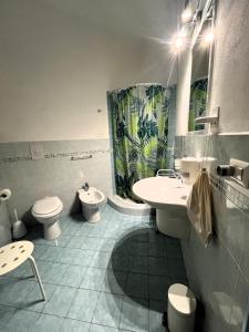 a bathroom with a sink and a toilet and a shower at La Fornace in Garessio +60 photos