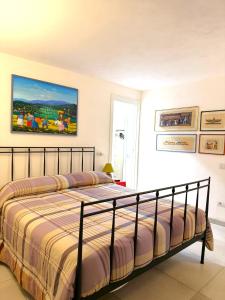 a bedroom with a bed in a room at Villa Delia in Cernobbio +20 photos