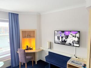 โทรทัศน์และ/หรือระบบความบันเทิงของ IntercityHotel Kiel