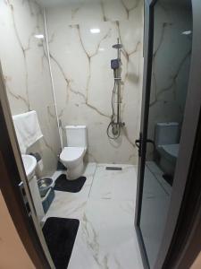 a bathroom with a toilet and a sink at Eghipatrush Guesthouse in Aparan