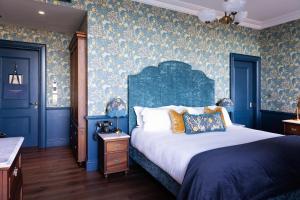 Voodi või voodid majutusasutuse Haddington House Hotel toas