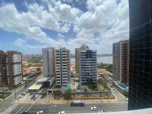 an aerial view of a city with tall buildings at Silva Hospedagem AMERICAN FLAT BEIRA MAR apartamento por temporada in São Luís