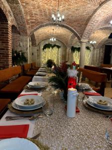 a long table with plates of food on it at Na Uboczu in Gryfów Śląski