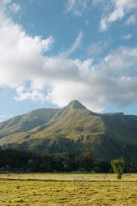 a mountain in the middle of a field at The Hamlet in Swellendam