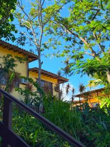 a view of a house from the garden at EstrelaMar Boutique in Búzios