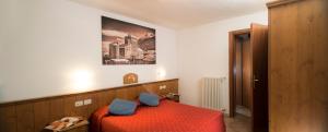 Postel nebo postele na pokoji v ubytování Hotel Residence Chateau