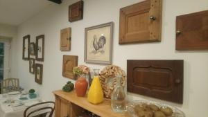 a kitchen counter with a table with food on it at Coté Cour Bischwihr Colmar 2 in Bischwihr