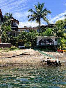 a view of a resort from the water at Cabana do Mar in Angra dos Reis