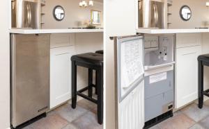 a kitchen with a counter and a bar stool at Phoenix X 609 condo in Orange Beach +54 photos