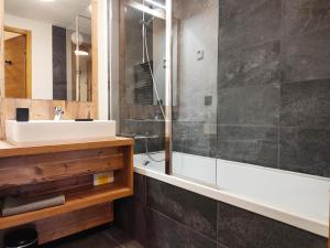 a bathroom with a sink and a shower at La Source in Saint-Gervais-les-Bains +16 photos