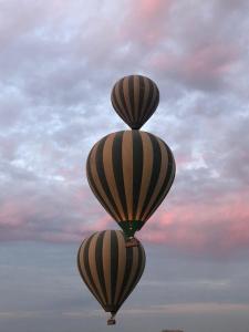 a large hot air balloon flying in the sky at Oloiba Nkuti lodge in Sekenani