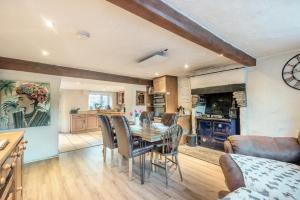 a kitchen and dining room with a table and chairs at 3 Bed in Nenthead oc-c34668 in Nenthead