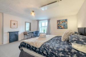 a bedroom with a bed and a desk at 3 Bed in Nenthead oc-c34668 in Nenthead
