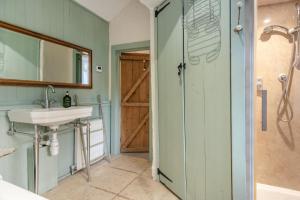 a bathroom with a sink and a shower at 3 Bed in Nenthead oc-c34668 in Nenthead +13 photos