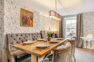 a dining room with a wooden table and chairs at 4 Bed in Nenthead oc-c34669 in Nenthead