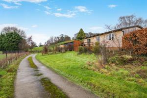 a dirt road in front of a house at 2 Bed in Coaley oc-s34729 in Coaley