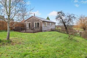a small house in a field with a yard at 2 Bed in Coaley oc-r34730 in Coaley