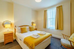 a bedroom with a bed with towels on it at 3 Bed in Gosforth oc-s34885 in Gosforth