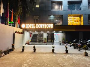 a building with a sign that reads hotel doorkatown at Hotel Downtown in Jamshedpur