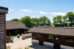an aerial view of two older buildings at 2 Bed in Alkham oc-a34787 in Swingfield