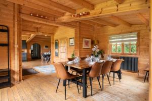 a wooden dining room with a table and chairs at 6 Bed in Alkham oc-p34791 in Swingfield
