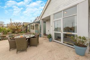 an outdoor patio with a table and chairs at 2 Bed in Bishopston oc-h28996 in Bishopston