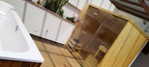 a wooden door with a window in a room at Hotel Boutique Cenit in Villa de Leyva +62 photos