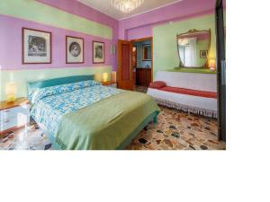 Postel nebo postele na pokoji v ubytování I Tetti Di Sassari B&B