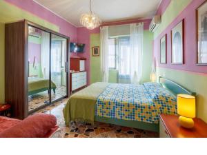 Postel nebo postele na pokoji v ubytování I Tetti Di Sassari B&B