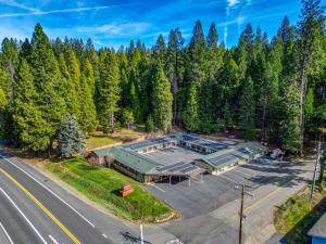an aerial view of a building with a lot of trees at Arnold Meadowmont Lodge in Arnold
