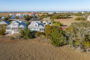 an aerial view of a house with the ocean in the background at Harbor Island 49 Nautical Watch in Fripp Island