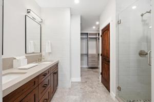 a bathroom with a sink and a shower at Snowline at Black Rock Ridge in Kamas +43 photos
