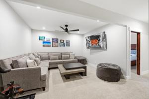 a living room with a couch and a table at Snowline at Black Rock Ridge in Kamas