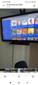 a flat screen tv sitting on top of a wall at Espectacular depto en, 3D 2B, 5 personas, Wifi Aire Estacionamiento in Curicó