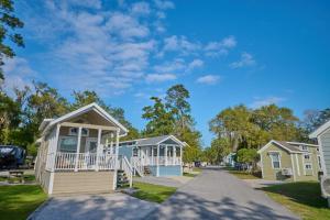 a row of beach cottages in a park at Live Oak Landing in Freeport