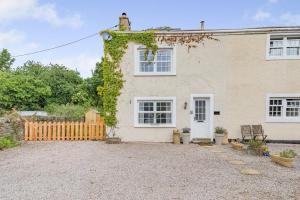 an exterior view of a house with a fence at 2 Bed in Brough oc-c31900 in Brough