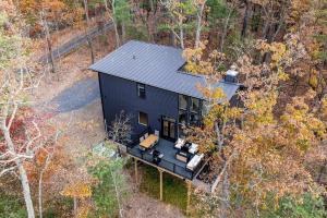 an overhead view of a black house in the woods at Valley View in Basye