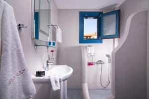 Koupelna v ubytování Evgenia Residences + 28 fotografií