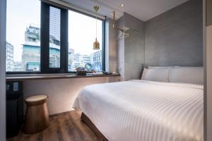 Postel nebo postele na pokoji v ubytování Hotel Relax 5
