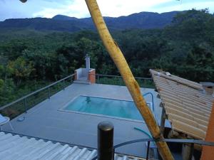a swimming pool on the roof of a house at Rancho Primavera in Santana do Riacho