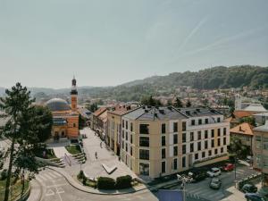 an overhead view of a city with a building at CENTRAL SQUARE Tuzla in Tuzla