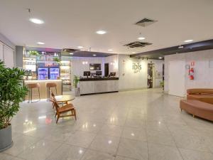 a lobby of a store with chairs and a table at ibis Copacabana Posto 2 in Rio de Janeiro
