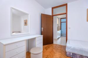 Posteľ alebo postele v izbe v ubytovaní MI Apartment