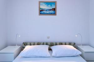 Posteľ alebo postele v izbe v ubytovaní MI Apartment