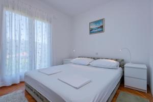 Posteľ alebo postele v izbe v ubytovaní MI Apartment