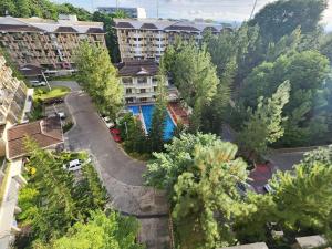 an aerial view of a resort with a swimming pool at 2 Bedroom Corner in Davao City