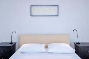 Posteľ alebo postele v izbe v ubytovaní MI Apartment